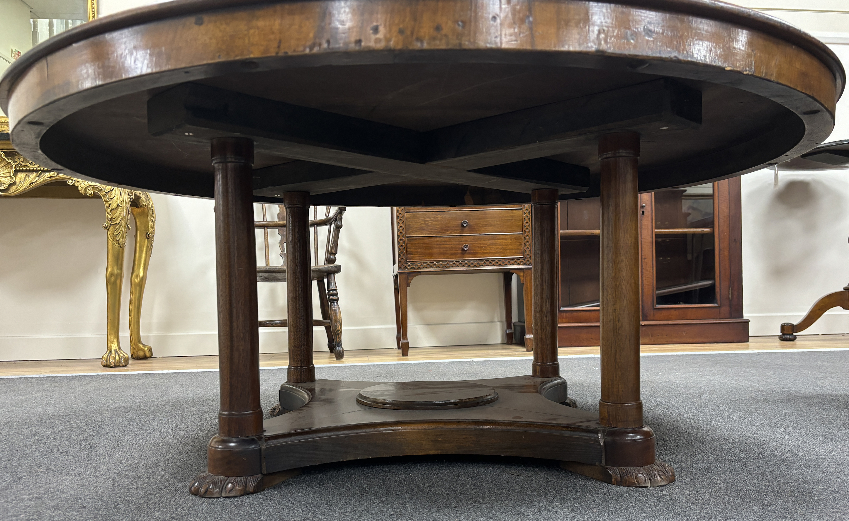 A 19th century and later circular Continental walnut low table, adapted and height reduced, diameter 120cm, height 53cm